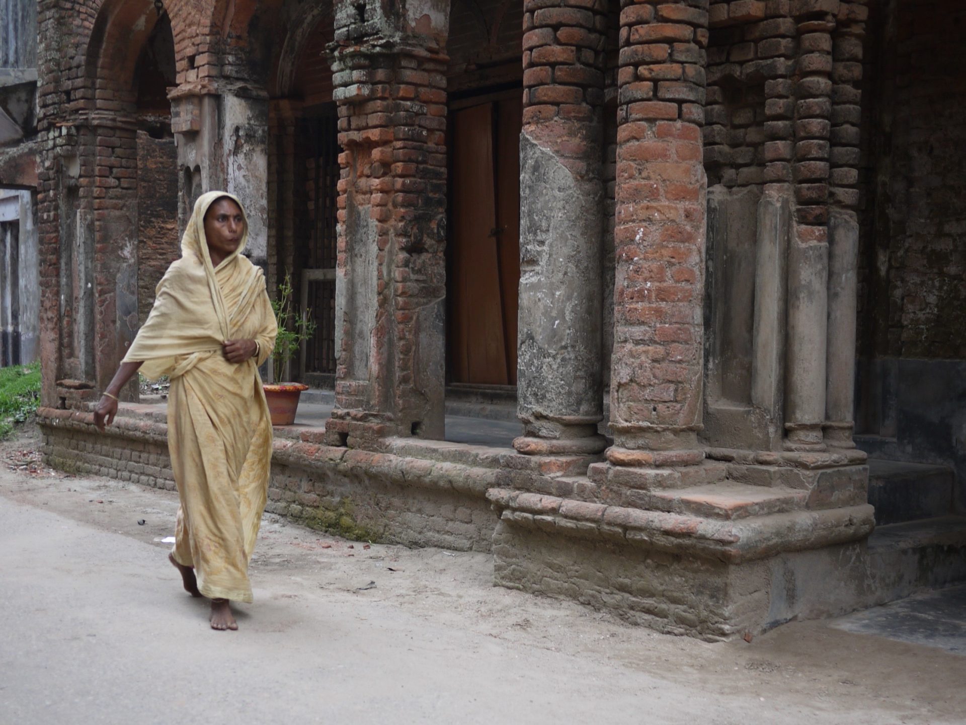 Bangladesh 40 Woman Walking Next to Building